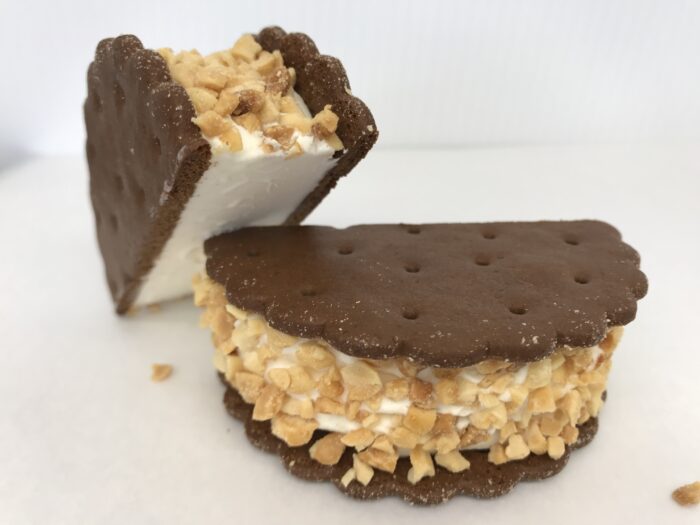 Wafer Cookies With Vanilla Ice Cream And Chopped Peanuts